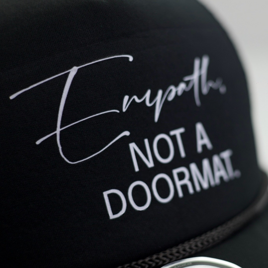 EMPATH NOT DOORMAT BLACK MESH TRUCKER HAT