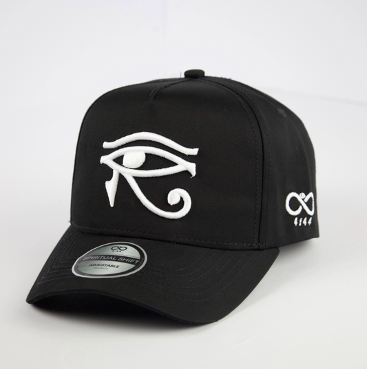 Black cap with white Eye of Horus symbol on a light gray background
