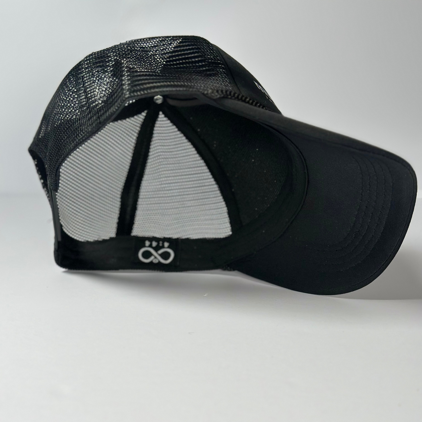 HEALING BLACK MESH TRUCKER HAT