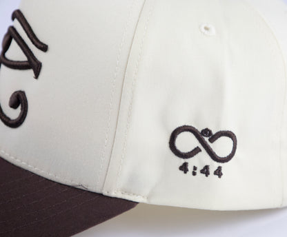 EYE OF HORUS BROWN TRUCKER HAT