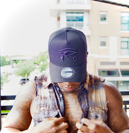 EYE OF HORUS BLACK TRUCKER HAT