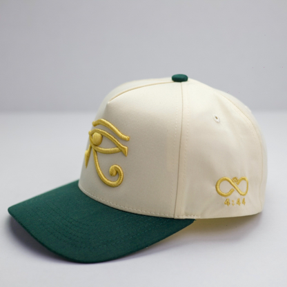 EYE OF HORUS GOLD TRUCKER HAT
