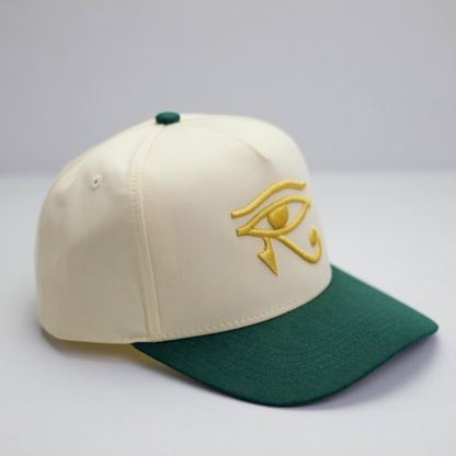 EYE OF HORUS GOLD TRUCKER HAT