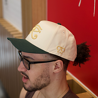 EYE OF HORUS GOLD TRUCKER HAT