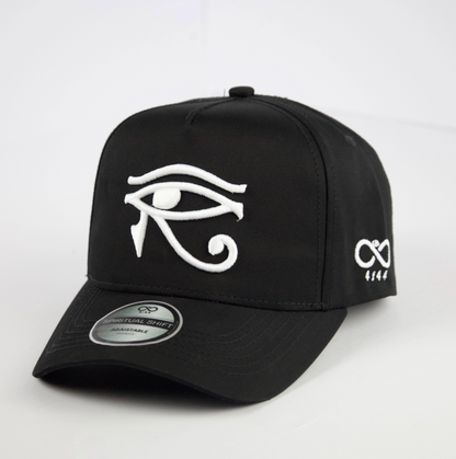 Black cap with white Eye of Horus symbol on a light gray background