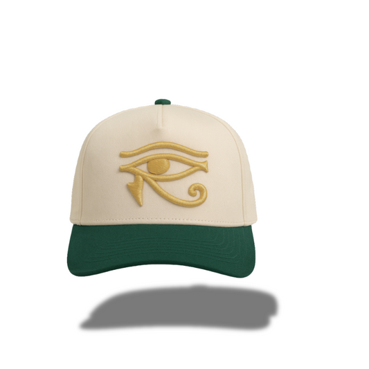 EYE OF HORUS GOLD TRUCKER HAT