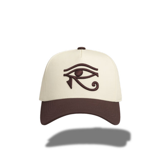 EYE OF HORUS BROWN TRUCKER HAT
