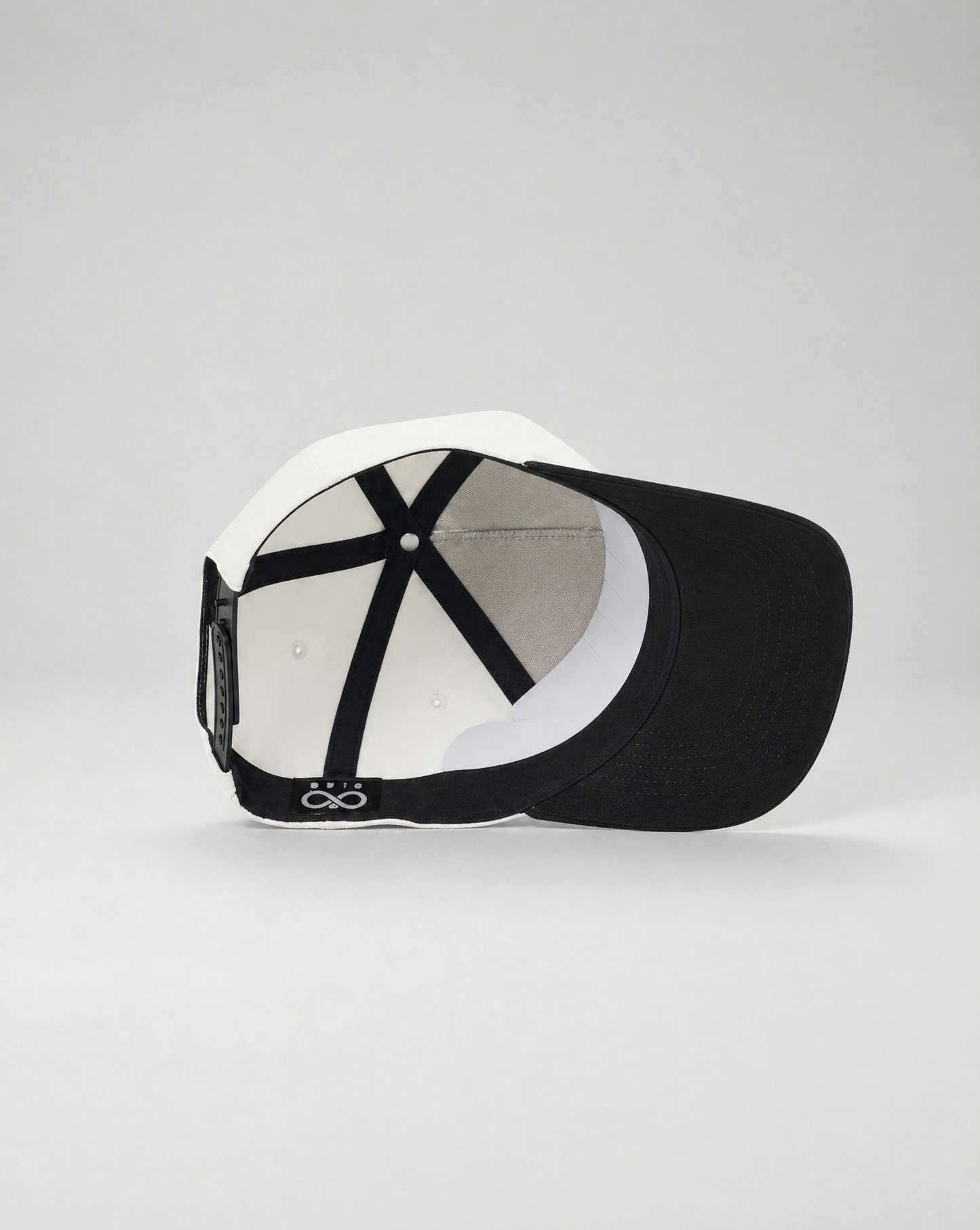 Black and white cap on a light gray background