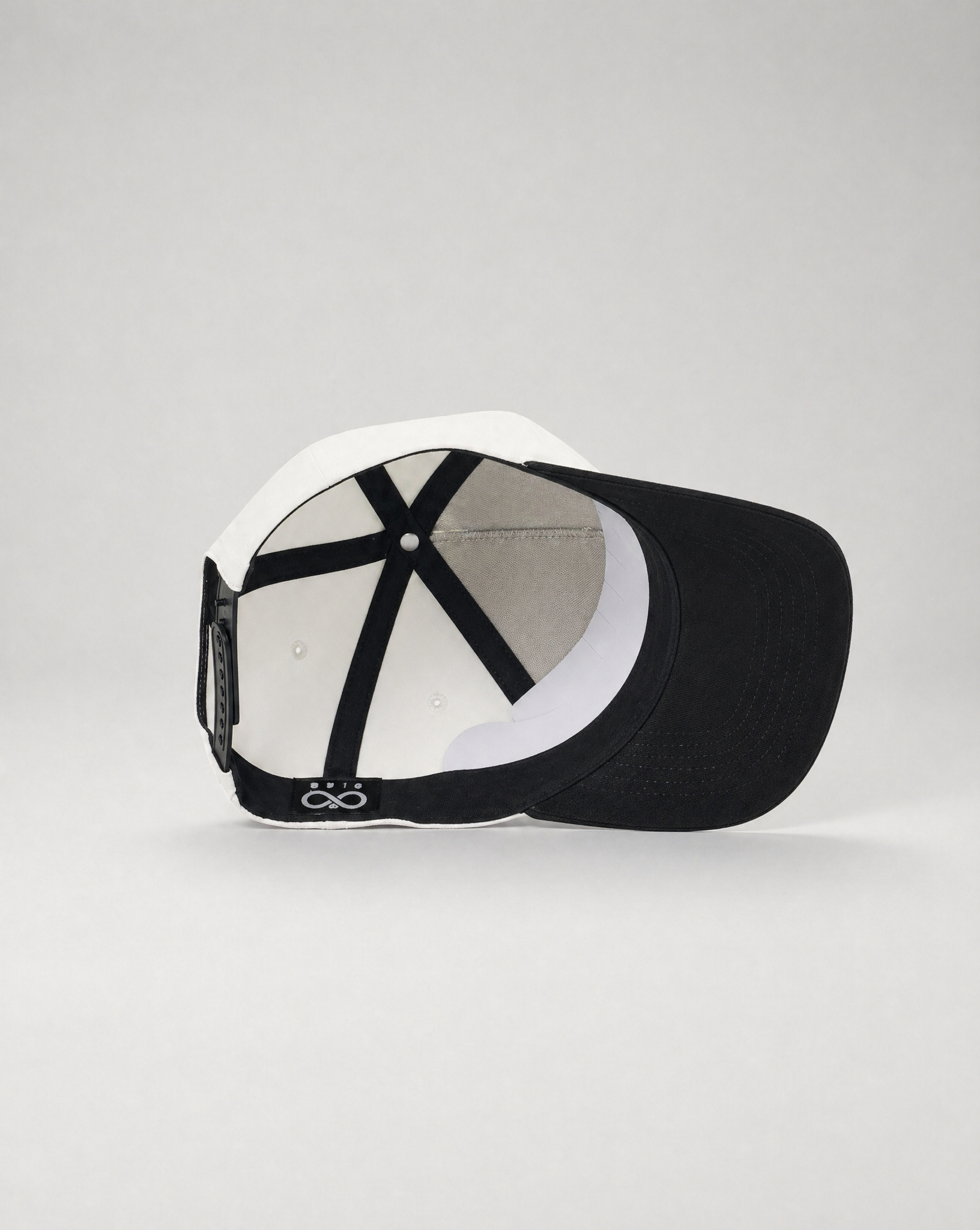Black and white cap on a light gray background