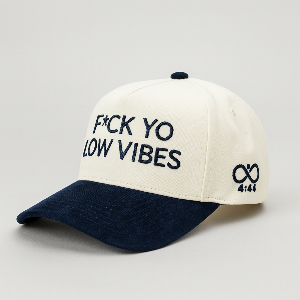 Cap with yo low vibes' text on a light gray background