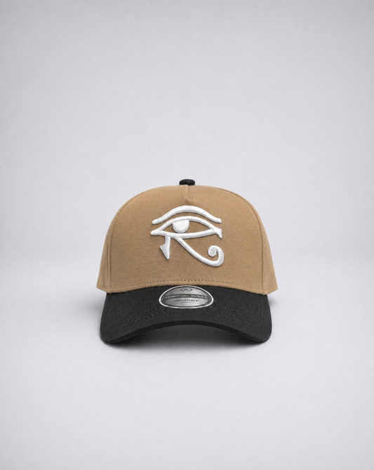 Two-tone cap with a white symbol on a light gray background