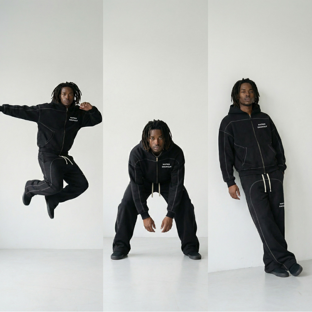 Person wearing a black tracksuit with white text on a white background